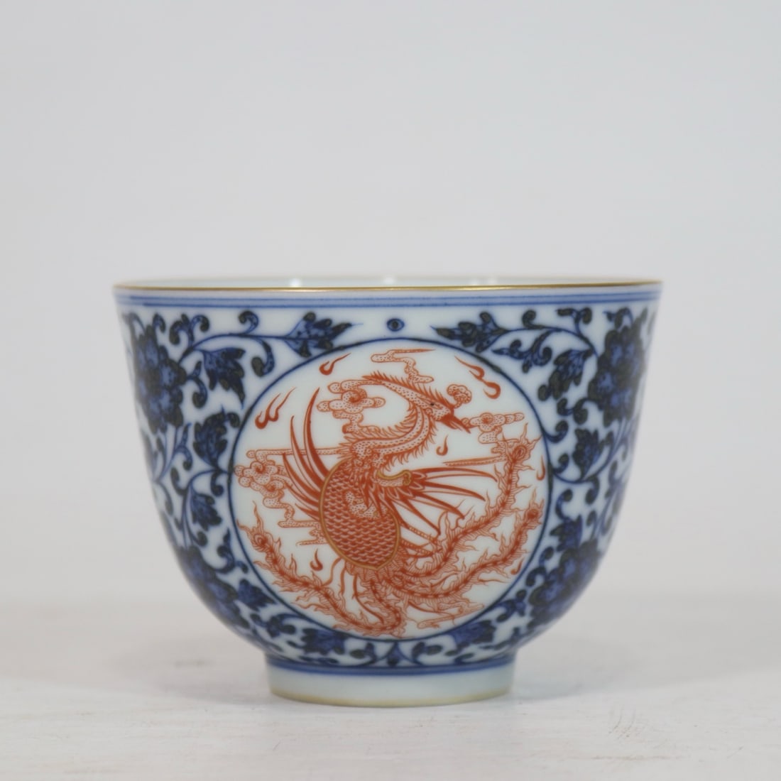 An Exquisite Blue and White Lotus Pattern Phoenix Pattern Cup: An Exquisite Blue and White Lotus Pattern Phoenix Pattern Cup Qing Dynasty, China Qianlong Six-character Mark Size:6.6cmx9cm (The Dimensions Of All Batches Are Manually Measured.If You Need More