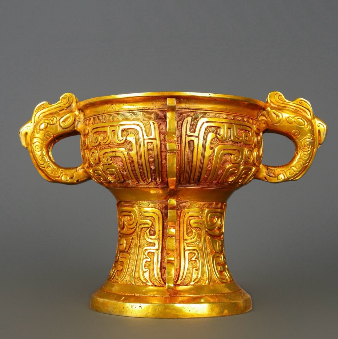 An Exquisite Gilt Bronze Double-Ears Censer: An Exquisite Gilt Bronze Double-Ears Censer Han Dynasty, China Size:17cmx27cm Weight:3600g (The Dimensions Of All Batches Are Manually Measured.If You Need More Detailed Information, Please Contact Ou