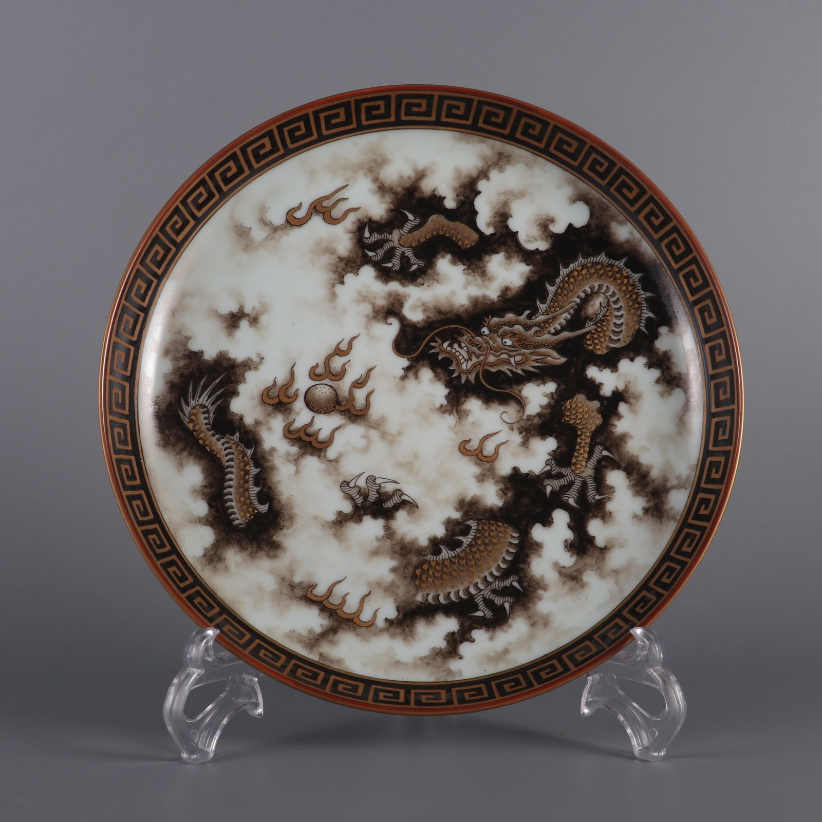 An Exquisite Ink Color Iron-Red Painted Gold Dragon Pattern Plate: An Exquisite Ink Color Iron-Red Painted Gold Dragon Pattern Plate Qing Dynasty, China Yongzheng Six-character Mark Size:3.6cmx21.2cm (The Dimensions Of All Batches Are Manually Measured.If You Need