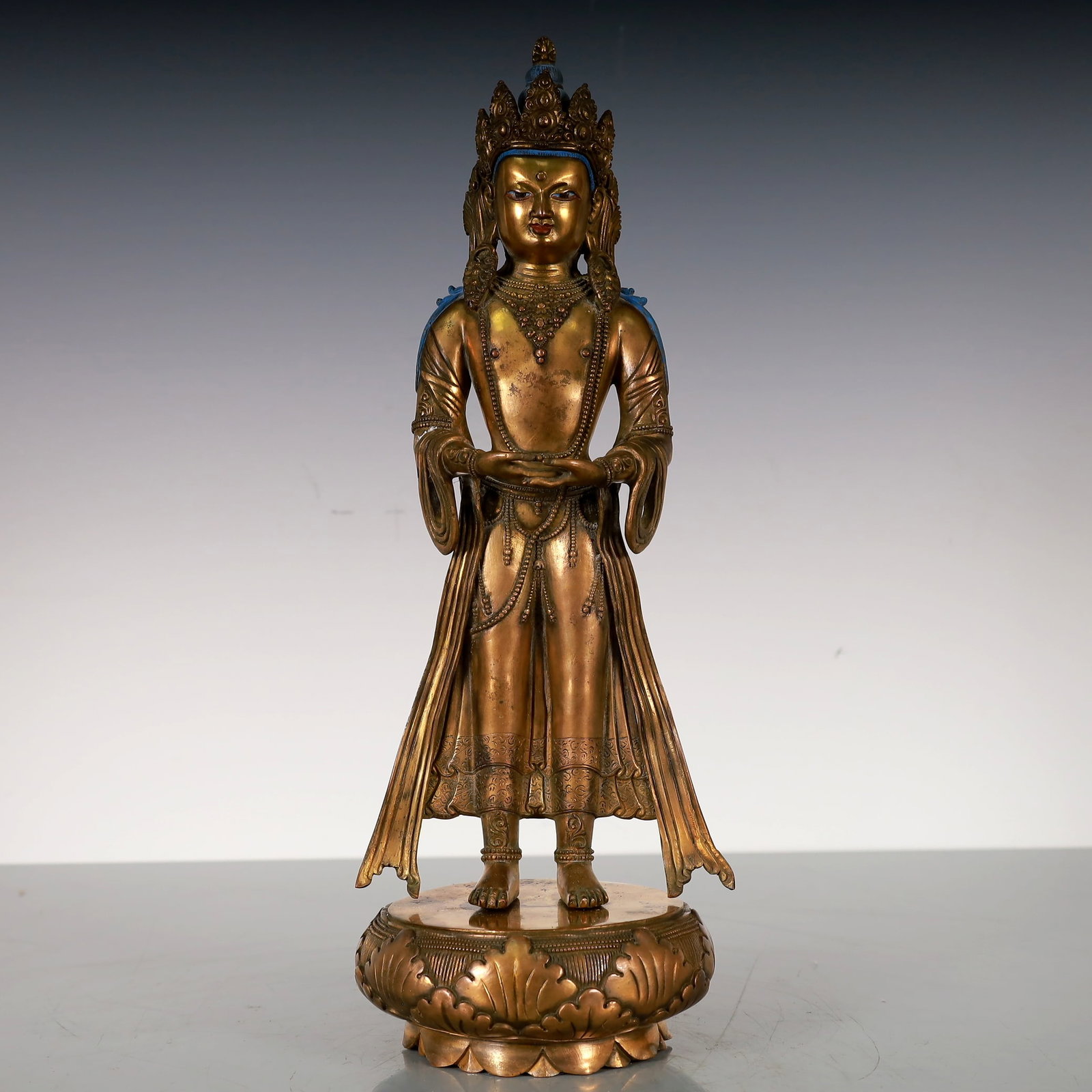 An Exquisite Gilt Bronze Statue of Gautama??s Mother: An Exquisite Gilt Bronze Statue of Gautama??s Mother Ming Dynasty, China Size:11cmx11cmx33cm Weight:2650g (The Dimensions Of All Batches Are Manually Measured.If You Need More Detailed Information,