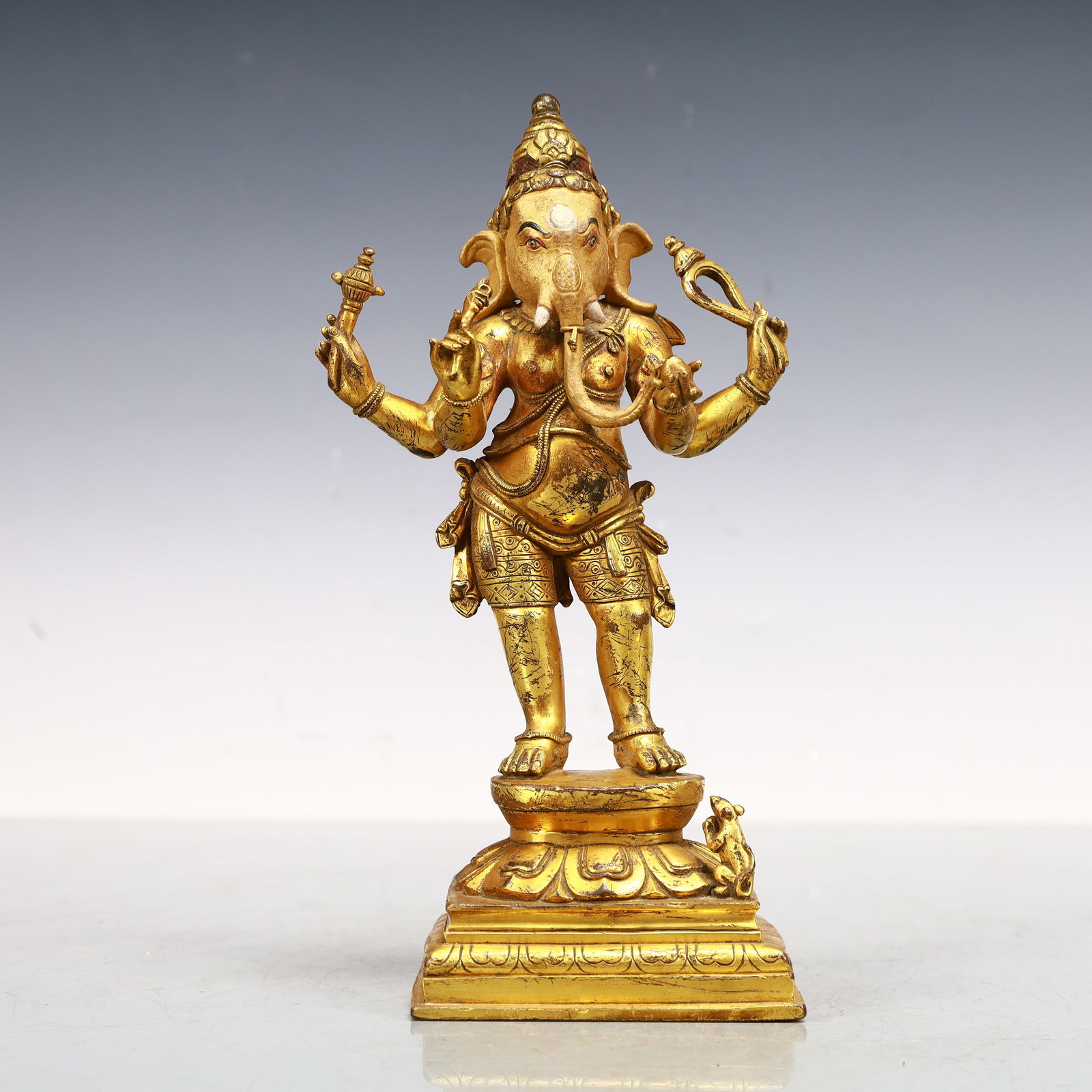 A Exquisite Gilt Bronze Statue of Mammon: A Exquisite Gilt Bronze Statue of Mammon Qing Dynasty, China Size:12cmx7cmx23cm Weight:1200g (The Dimensions Of All Batches Are Manually Measured.If You Need More Detailed Information, Please Contact