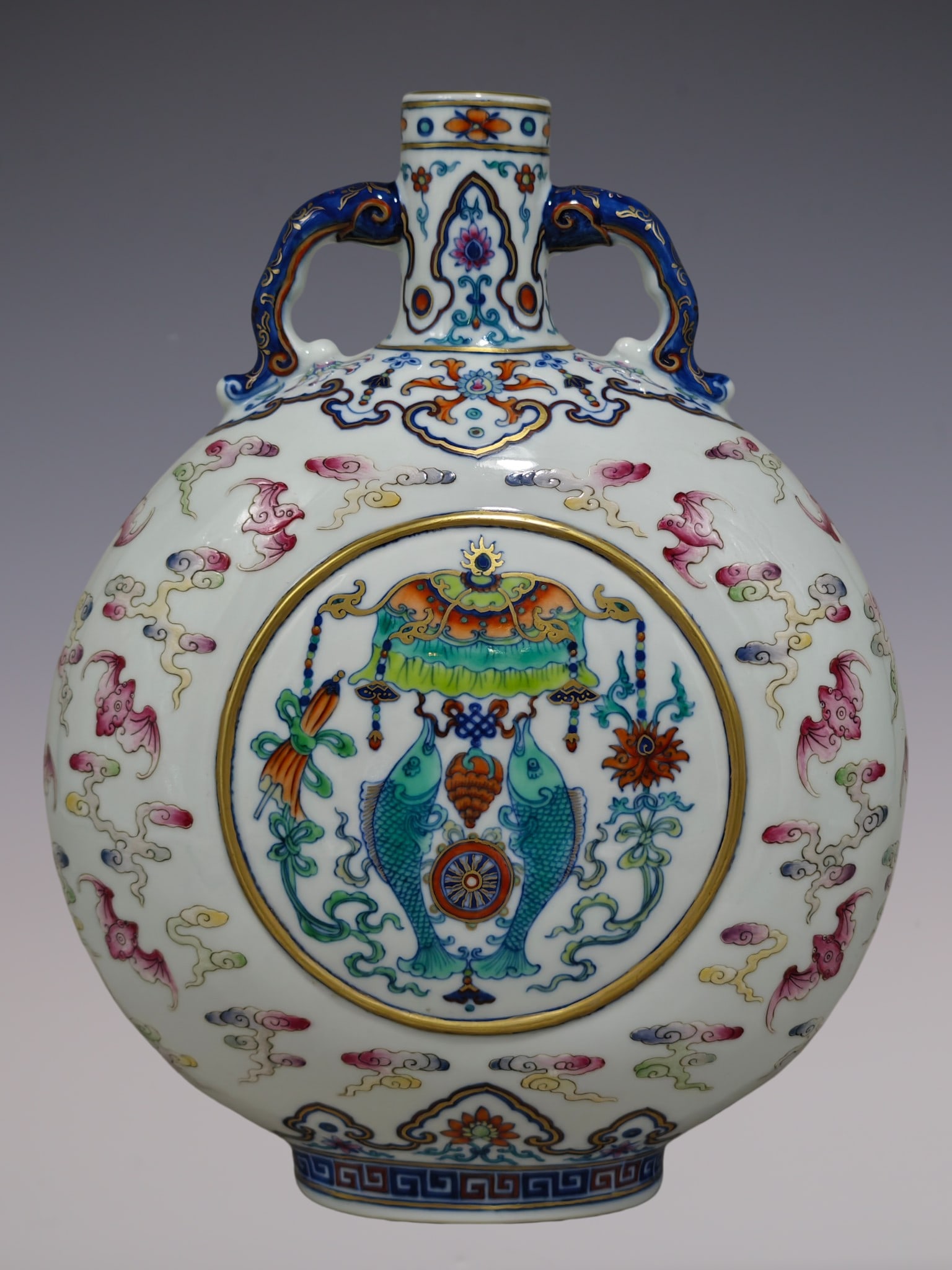 An Exquisite Famille-Rose Blue and White Bats Pattern Double-Ears Vase: An Exquisite Famille-Rose Blue and White Bats Pattern Double-Ears Vase Qing Dynasty, China Qianlong Six-character Mark Size:32cmx25cm (The Dimensions Of All Batches Are Manually Measured.If You Need