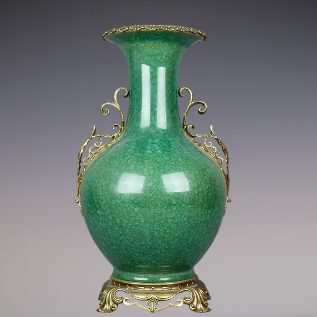 An Exquisite Green Glazed Inlaid Bronze Double-Ears Vase: An Exquisite Green Glazed Inlaid Bronze Double-Ears Vase Qing Dynasty, China Size:50.5cmx29cm (The Dimensions Of All Batches Are Manually Measured.If You Need More Detailed Information, Please
