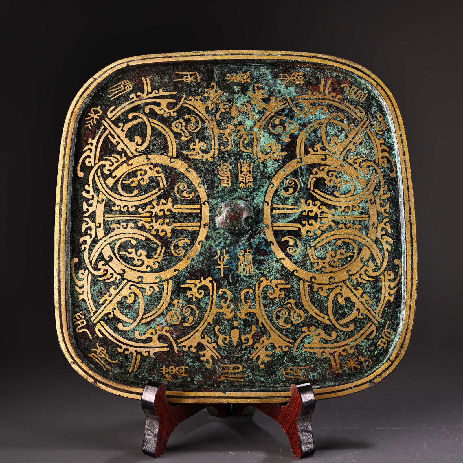 An Exquisite Bronze Inlaid Silver With Inscription Square Mirror: An Exquisite Bronze Inlaid Silver With Inscription Square Mirror Han Dynasty, China Size:12cmx12cm Weight:1300g (The Dimensions Of All Batches Are Manually Measured.If You Need More Detailed
