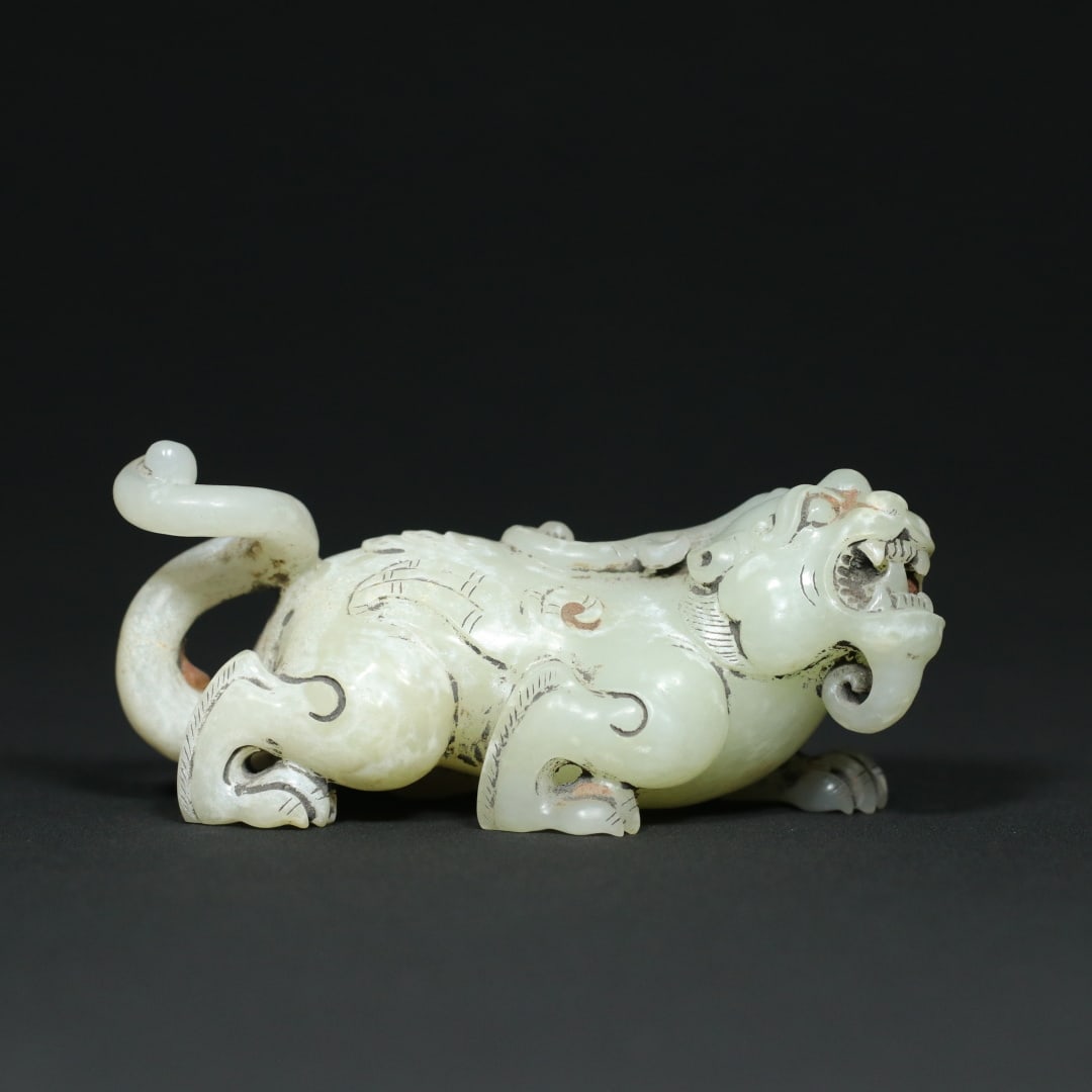 An Exquisite White Jade Auspicious Beast Ornament (1 of 9)