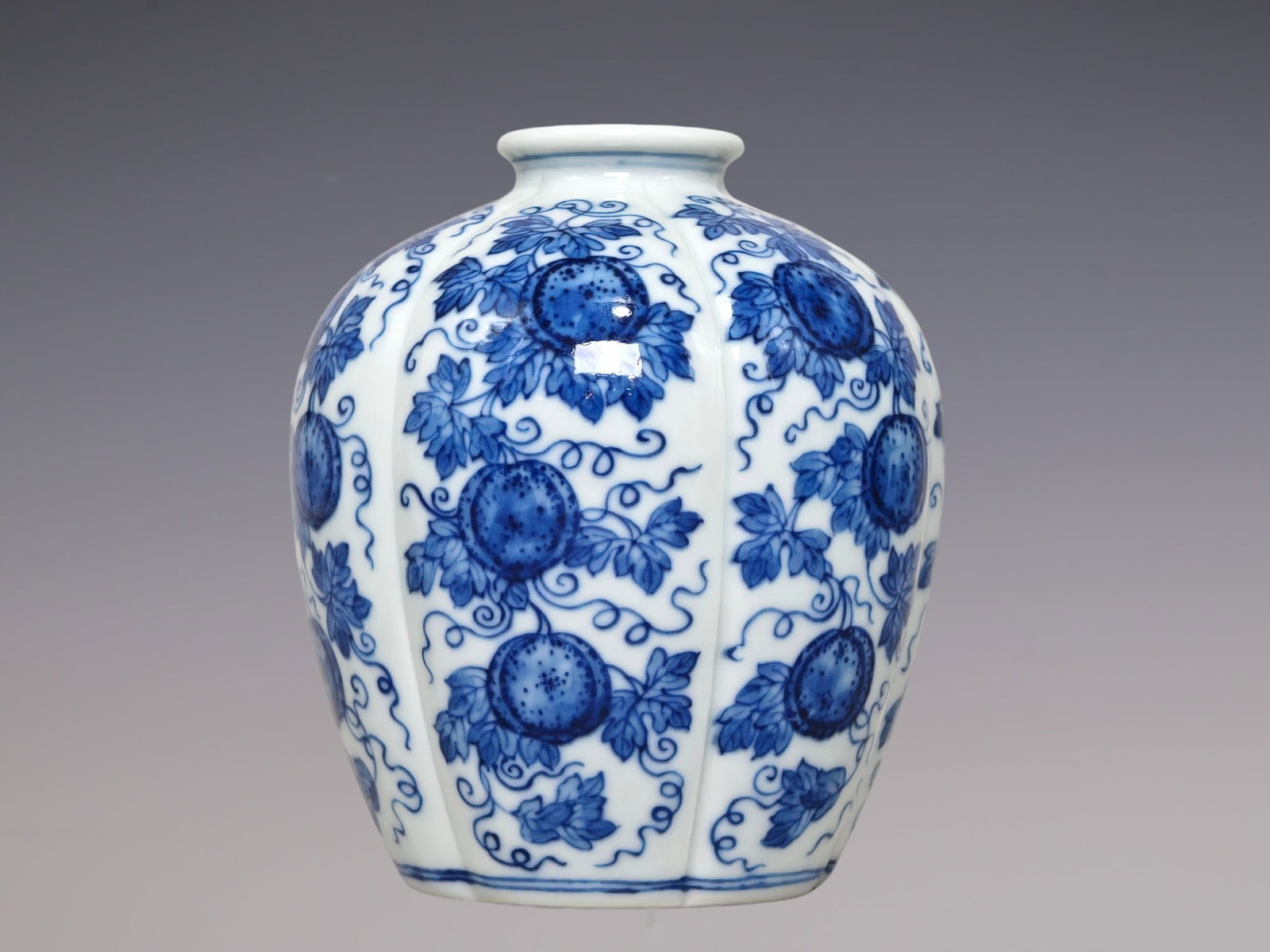 An Exquisite Blue and White Melon and Fruit Pattern Vase: An Exquisite Blue and White Melon and Fruit Pattern Vase Qing Dynasty, China Yongzheng Six-character Mark Size:11cmx10cm (The Dimensions Of All Batches Are Manually Measured.If You Need More Detailed