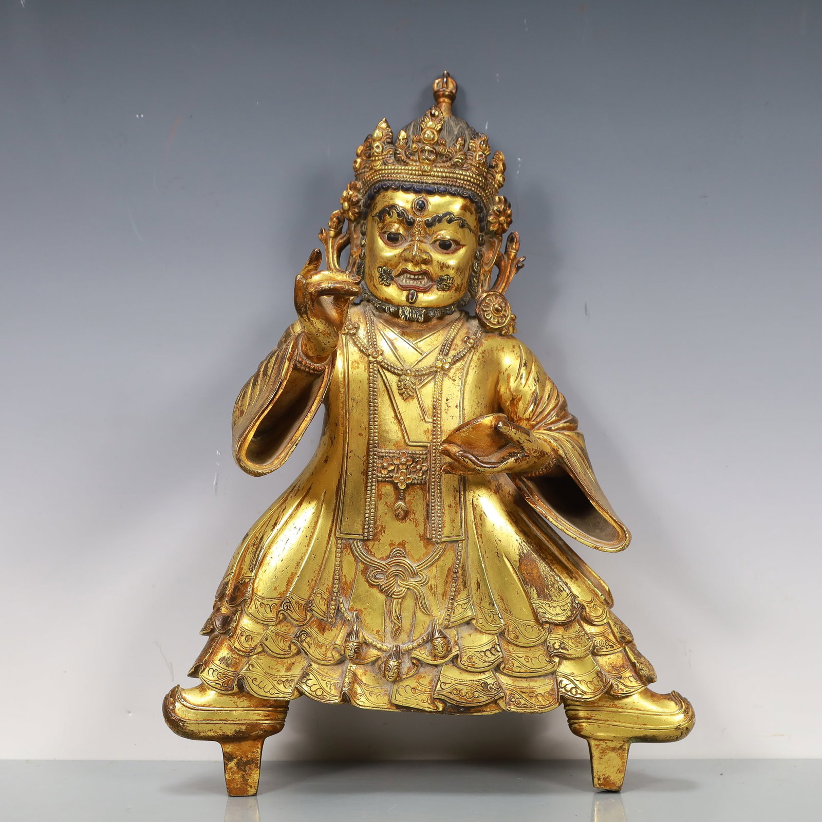 A Exquisite Gilt Bronze Statue of Mammon: A Exquisite Gilt Bronze Statue of Mammon Ming Dynasty, China Size:22cmx4cmx33cm Weight:4590g (The Dimensions Of All Batches Are Manually Measured.If You Need More Detailed Information, Please Contact