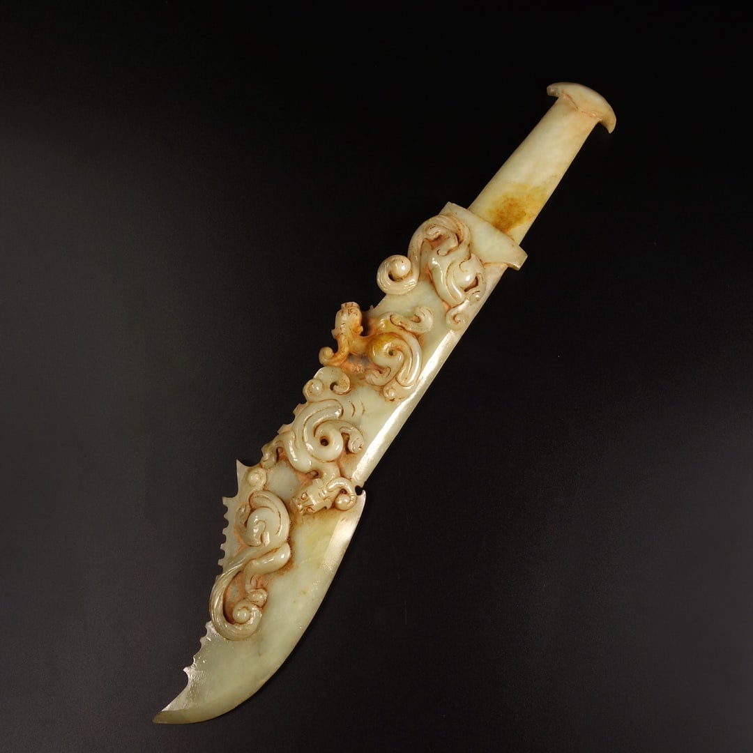An Exquisite White Jade Dragon Pattern Sword Ornament: An Exquisite White Jade Dragon Pattern Sword Ornament Han Dynasty, China Size:35.5cmx6.5cm Weight:410g (The Dimensions Of All Batches Are Manually Measured.If You Need More Detailed Information, Pleas