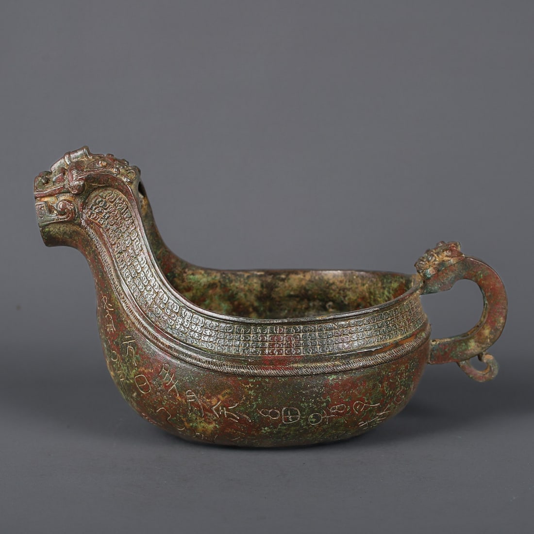 An Exquisite Bronze Beast-Face Pattern With Inscription Ewer: An Exquisite Bronze Beast-Face Pattern With Inscription Ewer W.Zhou , China Size:29.5cmx18.5cm Weight:1780g (The Dimensions Of All Batches Are Manually Measured.If You Need More Detailed Information,