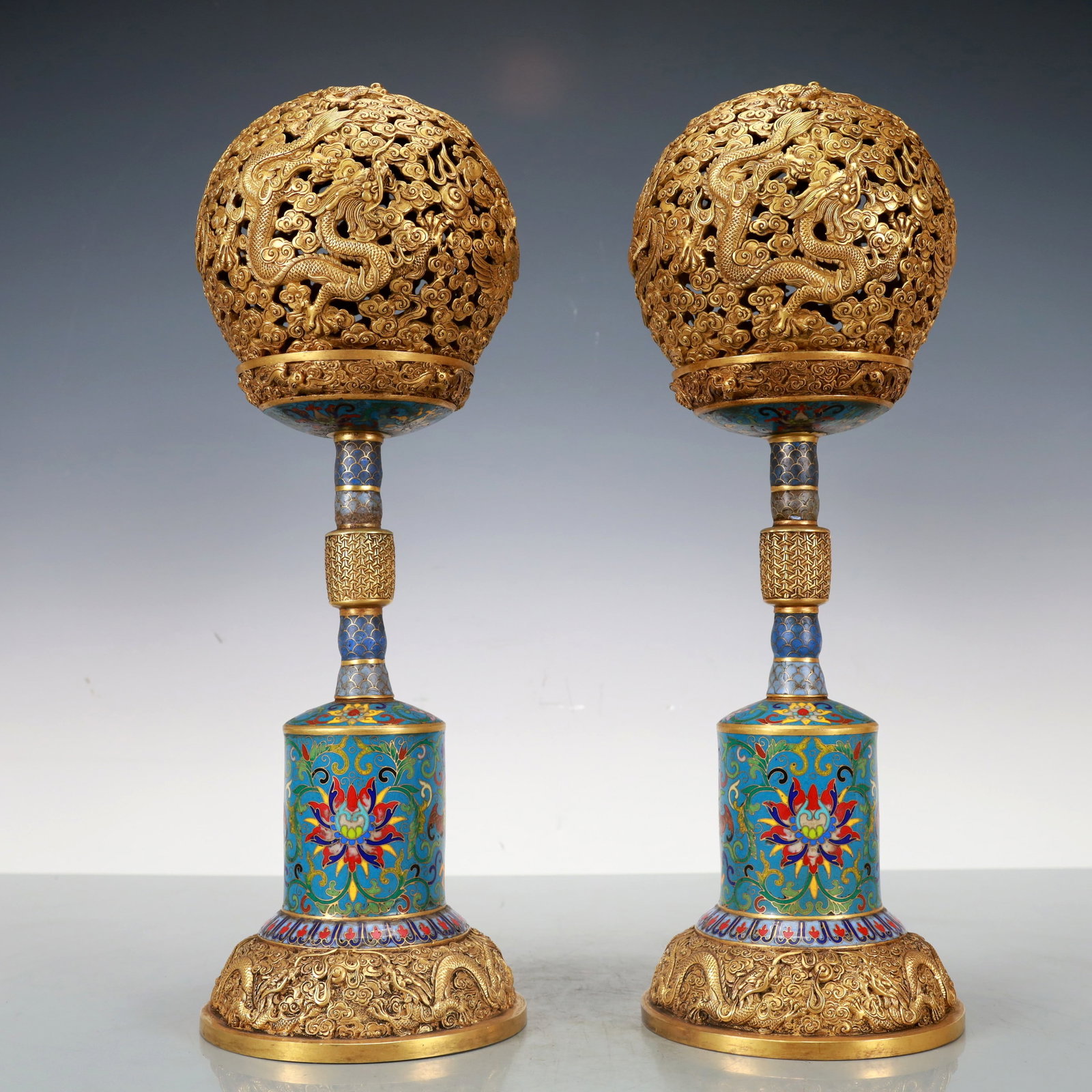 A Exquisite A pair of Cloisonne Gilt Bronze Dragon and Phoenix Pattern Ornament: A Exquisite A pair of Cloisonne Gilt Bronze Dragon and Phoenix Pattern Ornament Qing Dynasty, China Qianlong Four-character Mark Size:13cmx13cmx39cm Weight:6150g (The Dimensions Of All Batches Are Man
