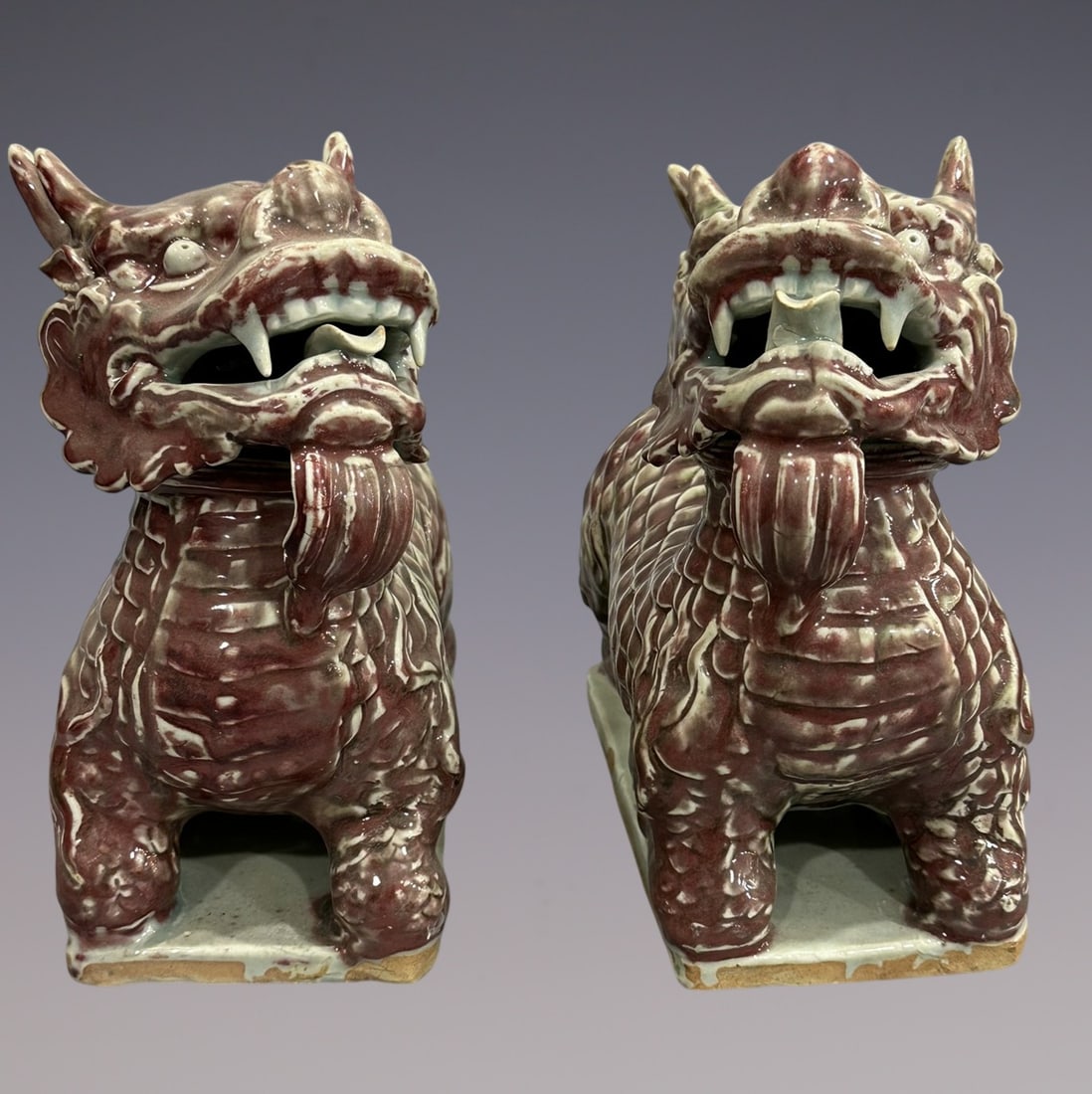 A Pair of Exquisite Blue and White Underglaze-Red Kylin: A Pair of Exquisite Blue and White Underglaze-Red Kylin Yuan Dynasty, China Size:22.5cmx28cmx22cm (The Dimensions Of All Batches Are Manually Measured.If You Need More Detailed Information, Please