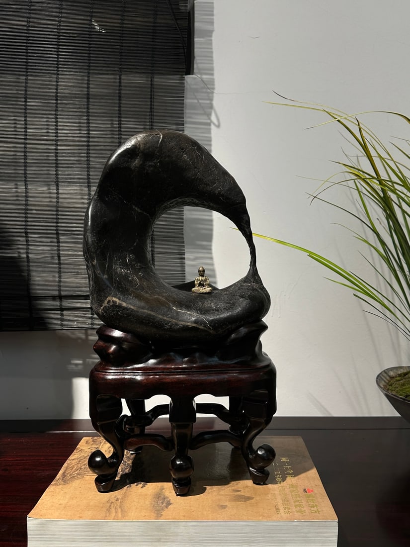 An Exquisite Taihu Stone Ornament: An Exquisite Taihu Stone Ornament Qing Dynasty, China Size:38cmx20cmx14cm (The Dimensions Of All Batches Are Manually Measured.If You Need More Detailed Information, Please Contact Our Customer