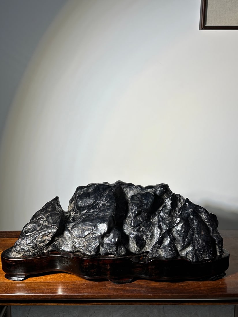 An Exquisite Lingbi Stone Rockery Ornament: An Exquisite Lingbi Stone Rockery Ornament Qing Dynasty, China Size:72cmx26cmx32cm (The Dimensions Of All Batches Are Manually Measured.If You Need More Detailed Information, Please Contact Our