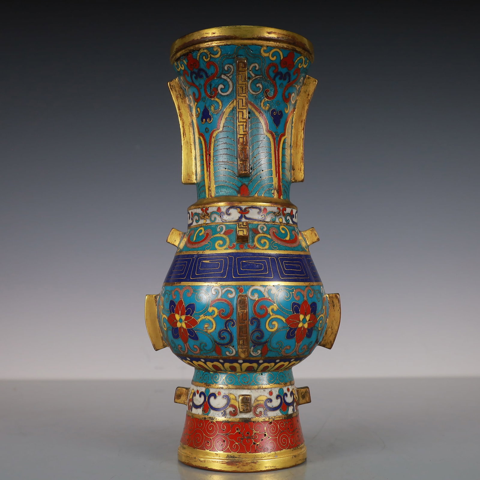 An Exquisite Cloisonne Gilt Bronze Lotus Pattern Flower Pattern Double-Ears Vase: An Exquisite Cloisonne Gilt Bronze Lotus Pattern Flower Pattern Double-Ears Vase Qing Dynasty, China Qianlong Six-character Mark Size:12cmx12cmx26cm Weight:1300g (The Dimensions Of All Batches Are