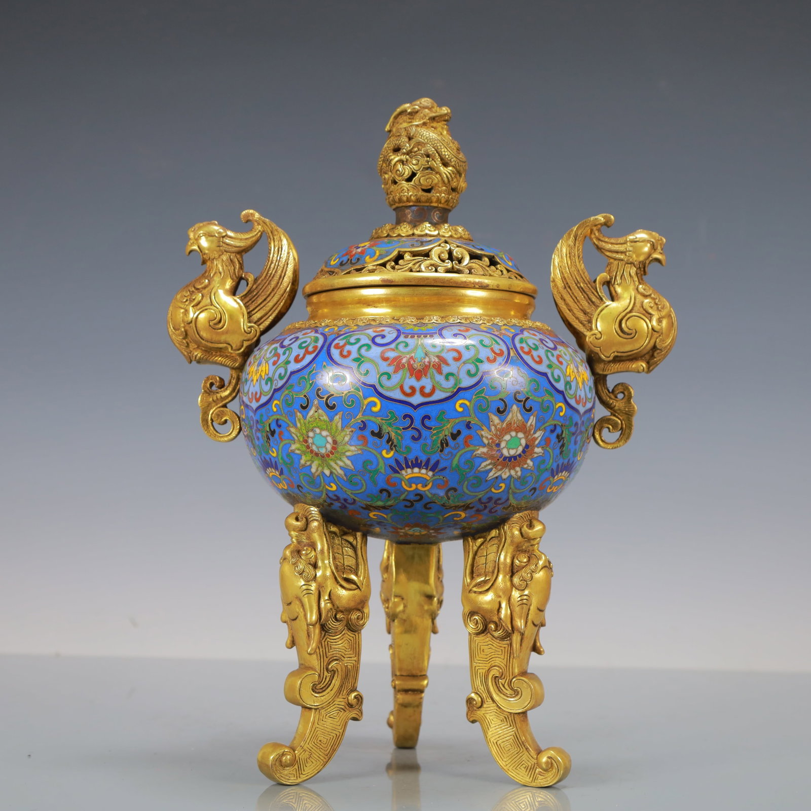 An Exquisite Cloisonne Lotus Pattern Phoenix-Ears and Tripod Censer: An Exquisite Cloisonne Lotus Pattern Phoenix-Ears and Tripod Censer Qing Dynasty China Qianlong Four-character Mark Size:29.6cmx22.5cm Weight:3500g (The Dimensions Of All Batches Are Manually
