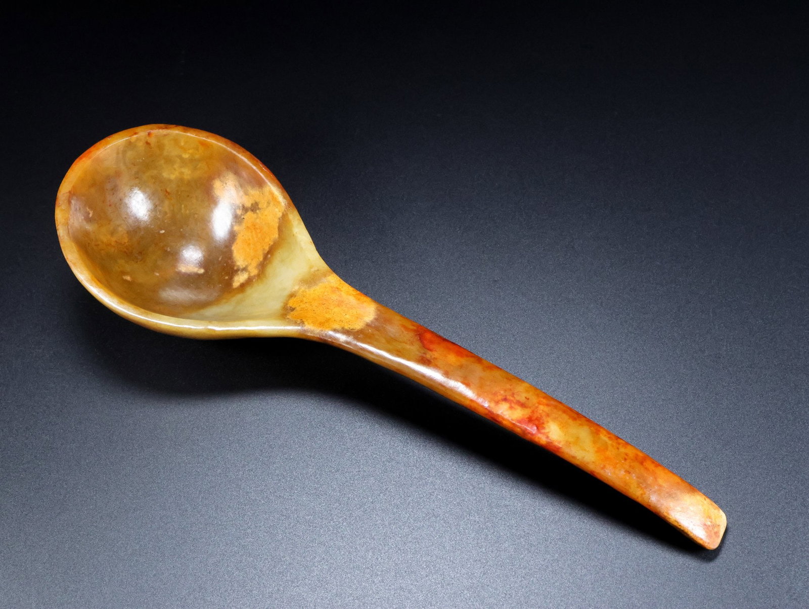 An Exquisite White Jade Spoon: An Exquisite White Jade Spoon Qing Dynasty, China Size:28cmx9cmx5cm Weight:339g (The Dimensions Of All Batches Are Manually Measured.If You Need More Detailed Information, Please Contact Our Customer