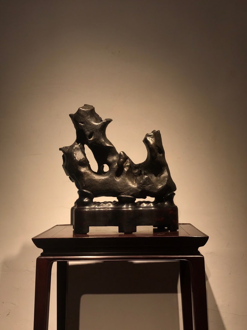An Exquisite Taihu Stone Ornament: An Exquisite Taihu Stone Ornament Qing Dynasty, China Size:45cmx43cmx21cm (The Dimensions Of All Batches Are Manually Measured.If You Need More Detailed Information, Please Contact Our Customer