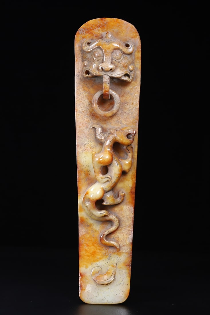 An Exquisite White Jade Chi-Dragon Pattern Beast-Face Pattern Ornament: An Exquisite White Jade Chi-Dragon Pattern Beast-Face Pattern Ornament Han Dynasty, China Size:27.3cmx6.5cmx3.5cm Weight:554.5g (The Dimensions Of All Batches Are Manually Measured.If You Need More De