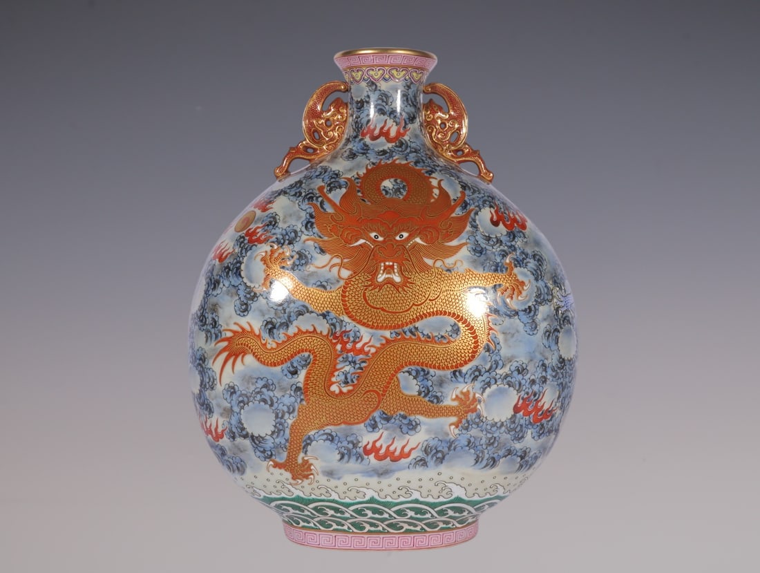 An Exquisite Famille-Rose Painted Gold Dragon Pattern Seawater Pattern Double-Ears Vase: An Exquisite Famille-Rose Painted Gold Dragon Pattern Seawater Pattern Double-Ears Vase Qing Dynasty, China Qianlong Six-character Mark Size:30.3cmx24cm (The Dimensions Of All Batches Are Manually