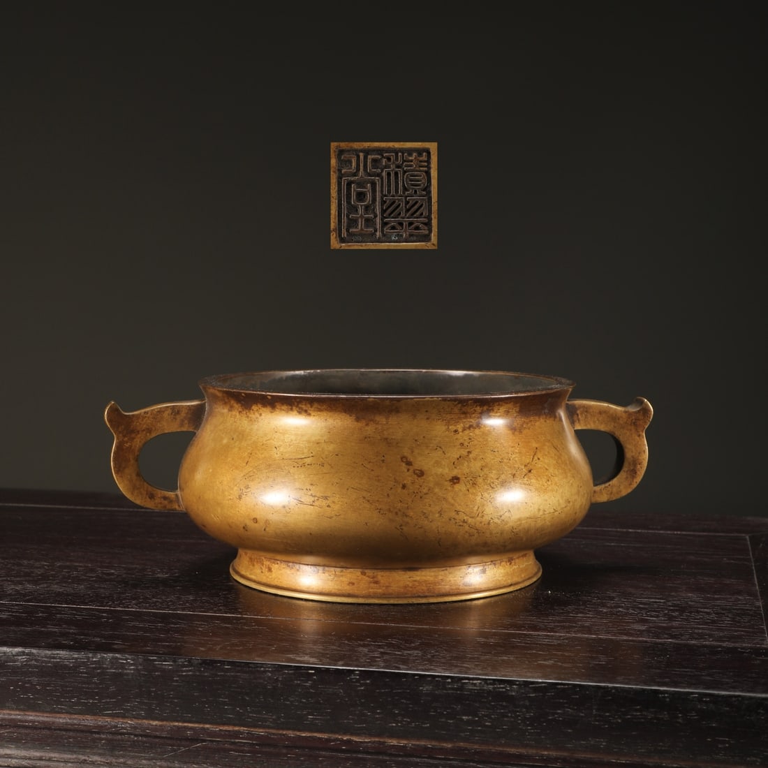 An Exquisite Bronze Double-Ears Censer: An Exquisite Bronze Double-Ears Censer Ming Dynasty, China Size:8cmx16.9cm Weight:1650g (The Dimensions Of All Batches Are Manually Measured.If You Need More Detailed Information, Please Contact Our