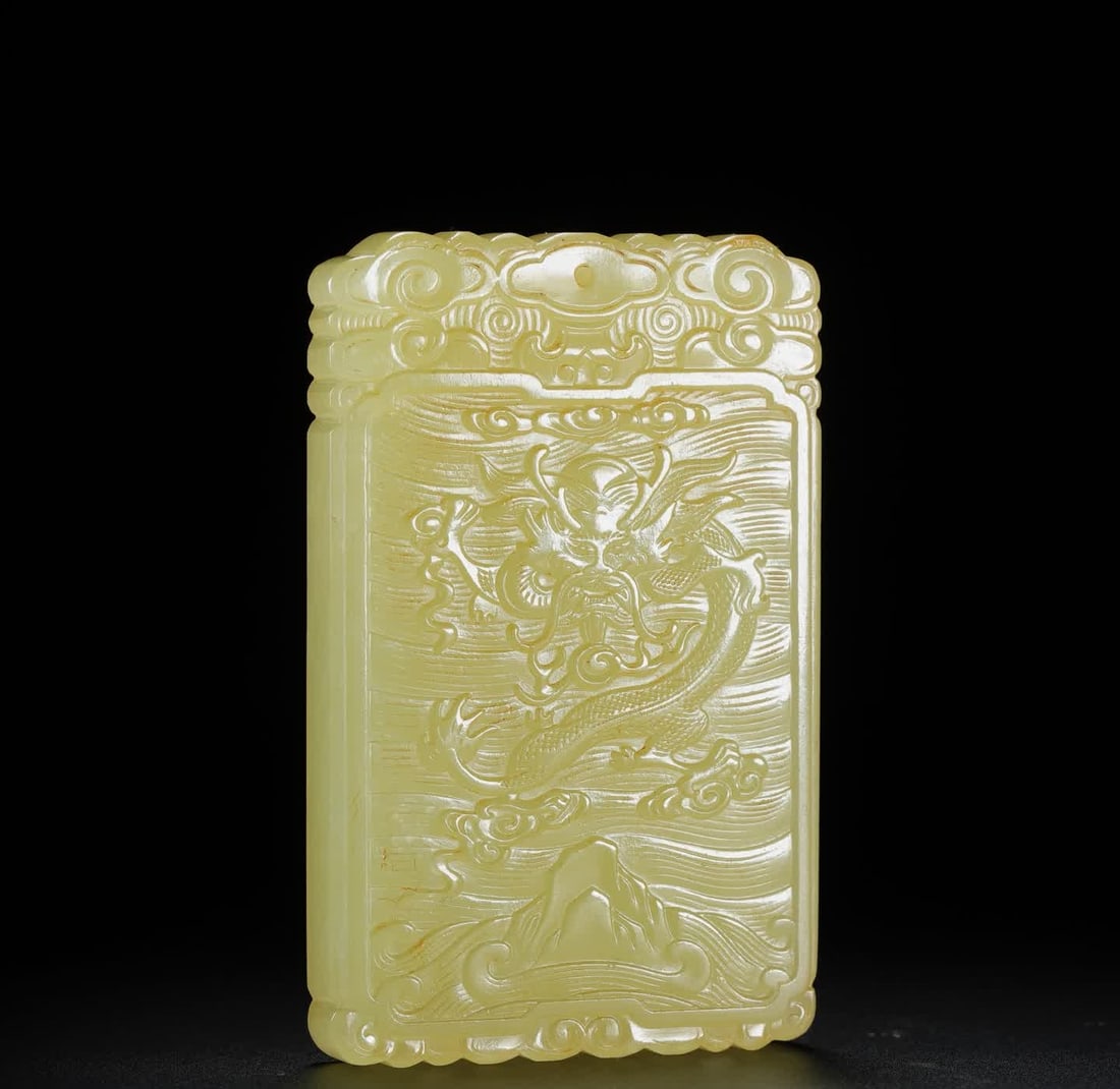 A Qing Dynasty Hetian yellow jade plaque with dragon and phoenix patterns: Qing Dynasty Hetian yellow jade plaque with dragon and phoenix patterns SIZE: 6.5x4.2x0.8cm W:55g (The Dimensions Of All Batches Are Manually Measured.If You Need More Detailed Information, Please Con