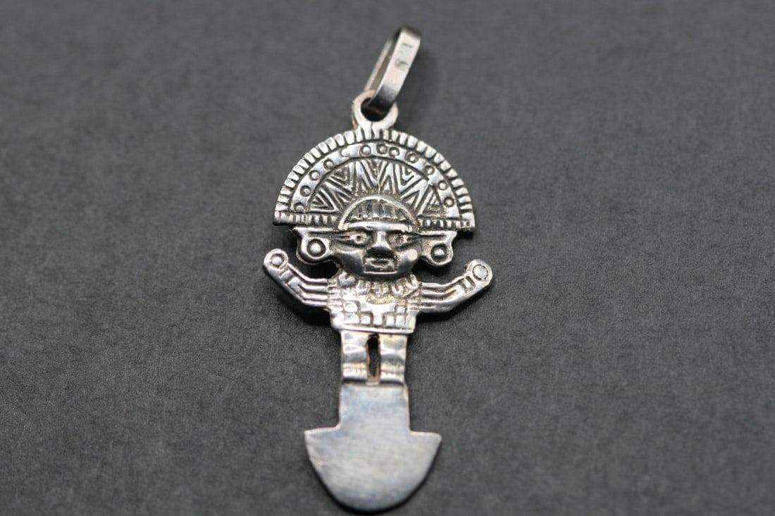 Inca Mayan Sun God Sterling Silver 925 Pendant Charm spoon .Lot#295: Inca Mayan Sun God Sterling Silver 925 Pendant Charm spoon measures 1 3/8" x 3/4" signed 925 on the bale