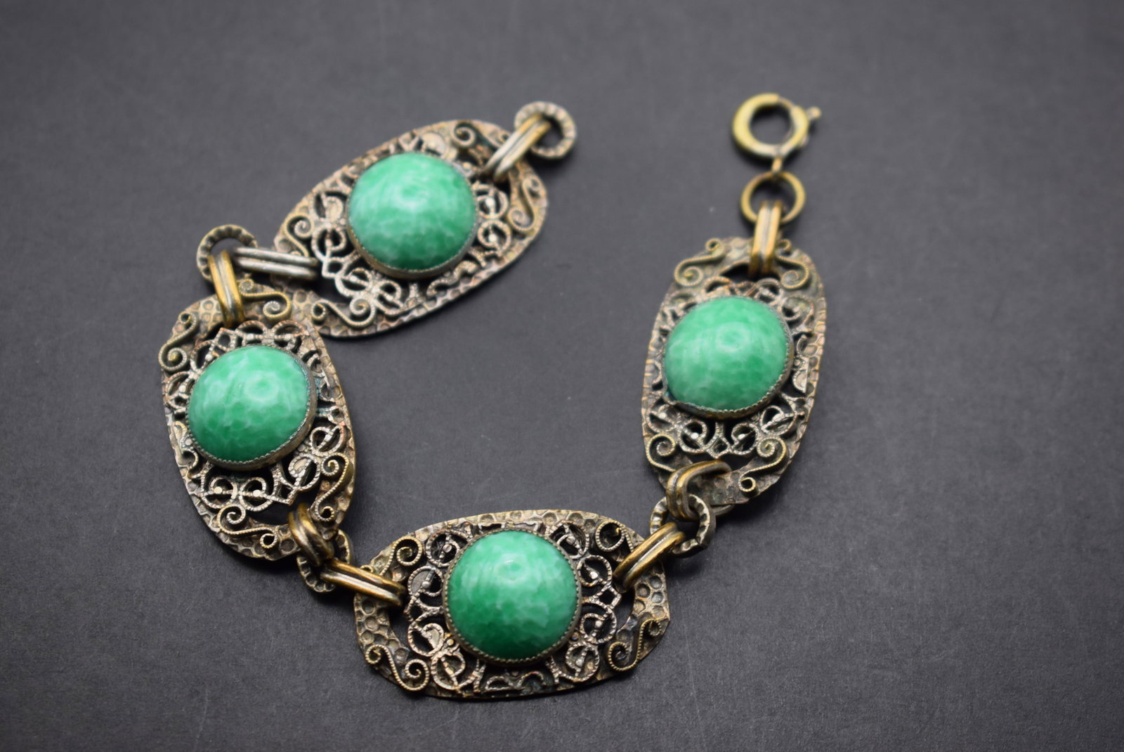 Mottled Green Glass Jadeite Filigree Srolled Bracelet Vintage Lot 474: Mottled Green Glass Jadeite Filigree Srolled Bracelet Vintage measures 7" x 3/4"