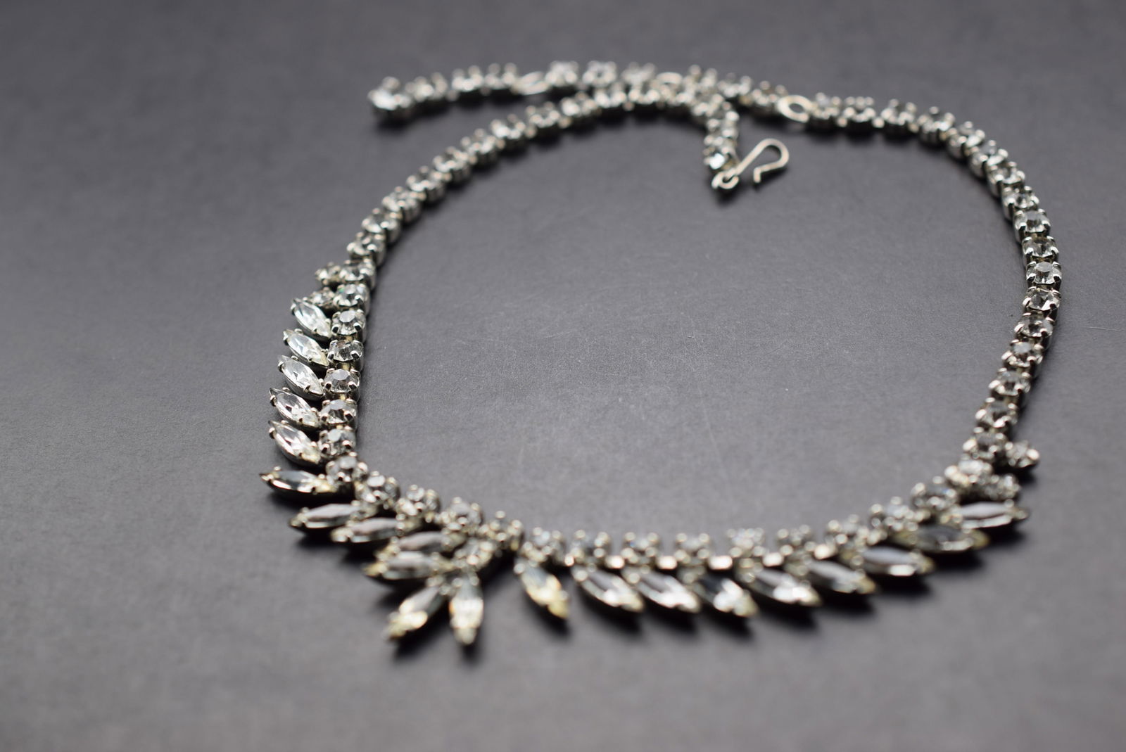 Sherman Rhinestone Necklace unsigned 1950's Lot 501: Sherman Rhinestone Necklace unsigned 1950's measures 16.5" long 1" drop front