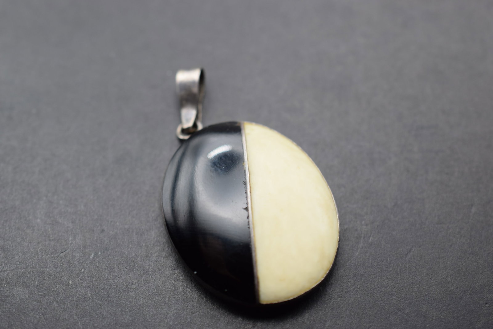 Ebony Bone Sterling 925 Silver Pendant Lot 709: Ebony Bone Sterling 925 Silver Pendant Measures 1 1/8" x 1" without the bale