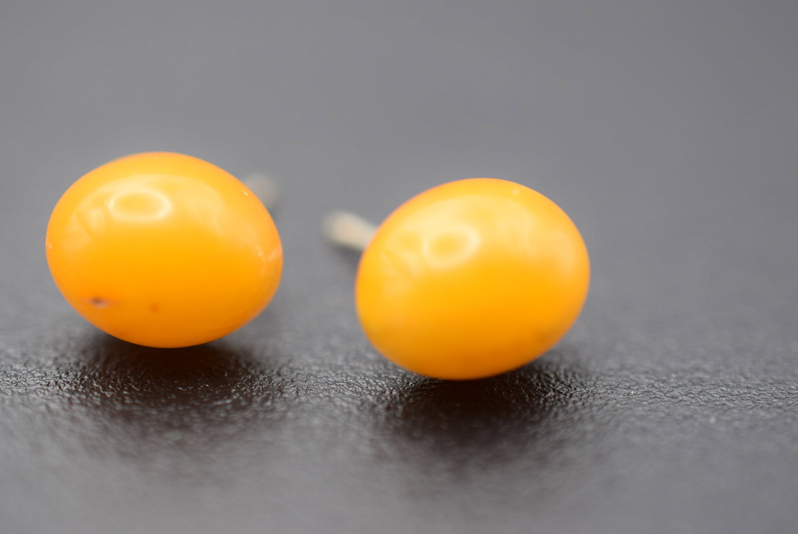 Genuine Egg Yolk Amber Stud Pierced Earrings Sterling Lot 914: Genuine Egg Yolk Amber Stud Pierced Earrings Sterling Posts and Butterfly backings measures 3/8" x 1/4" 10mm