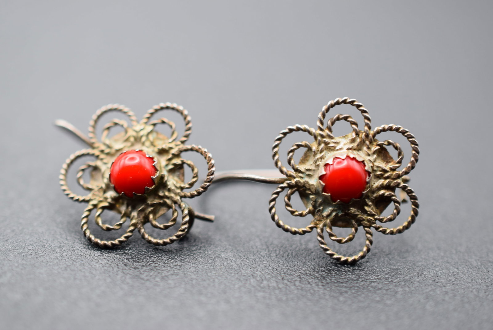 Filigree Coral Stud Pirced Earrings Lot 1053: Filigree Coral Stud Pirced Earrings measures 5/8" in diameter
