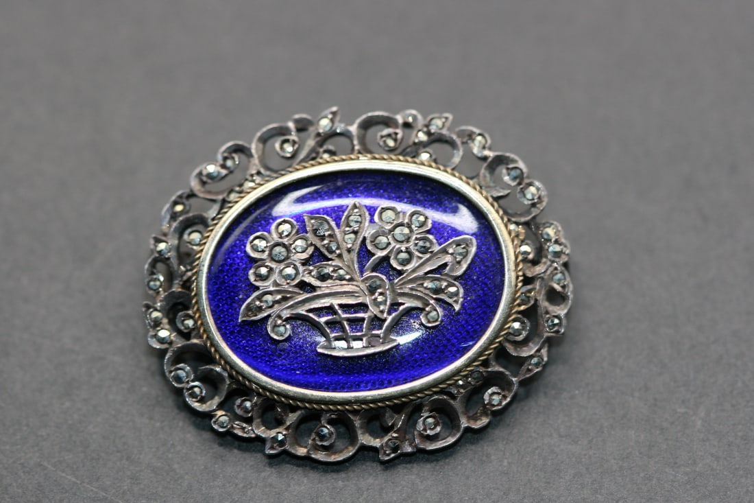 Marcasite Sterling Colbalt Blue French Guilloche Brooch Pin Vintage Lot 671: Marcasite Sterling Colbalt Blue French Guilloche Brooch Pin Vintage is really beautiful and measures 1 1/4" x 1 1/8" and is stamped on the back
