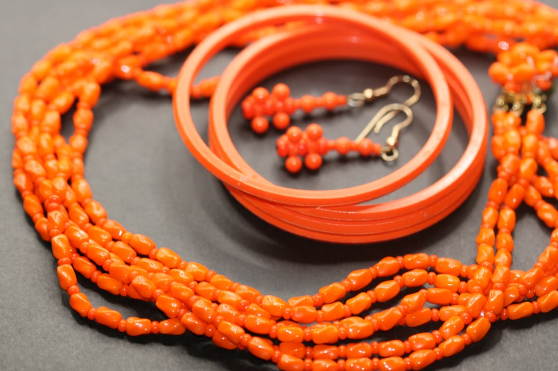 Orange Glass 6 strand Necklace Vintage Earrings bracelets Lot 871: Orange Glass 6 strand Necklace Vintage with bracelets and Pierced Earrings Necklace measures 17 1/2" long and the 4 matching bracelets are vintage plastics with an opening of 2 1/2" the earrings are 1