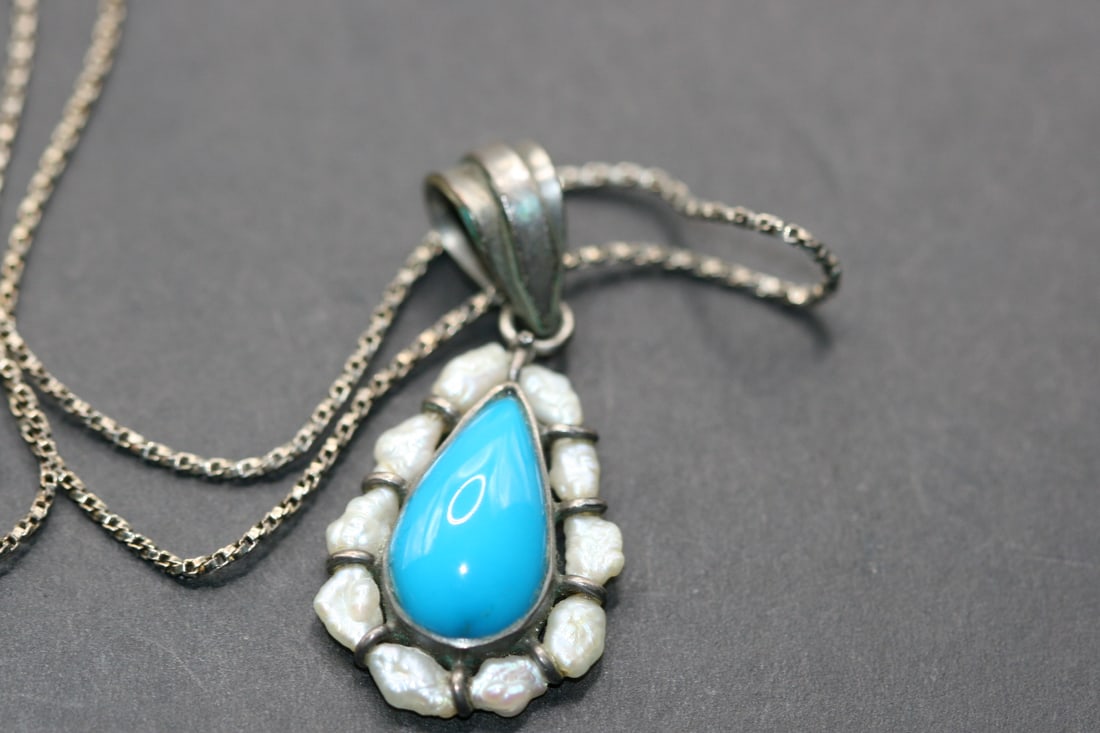 Turquoise Freshwater Pearl Sterling Chain Necklace Pendant Lot 974: Turquoise Freshwater Pearl Sterling Chain Necklace Pendant chain signed 925 measures 24" long pendant measures 1 1/2" x 3/4"