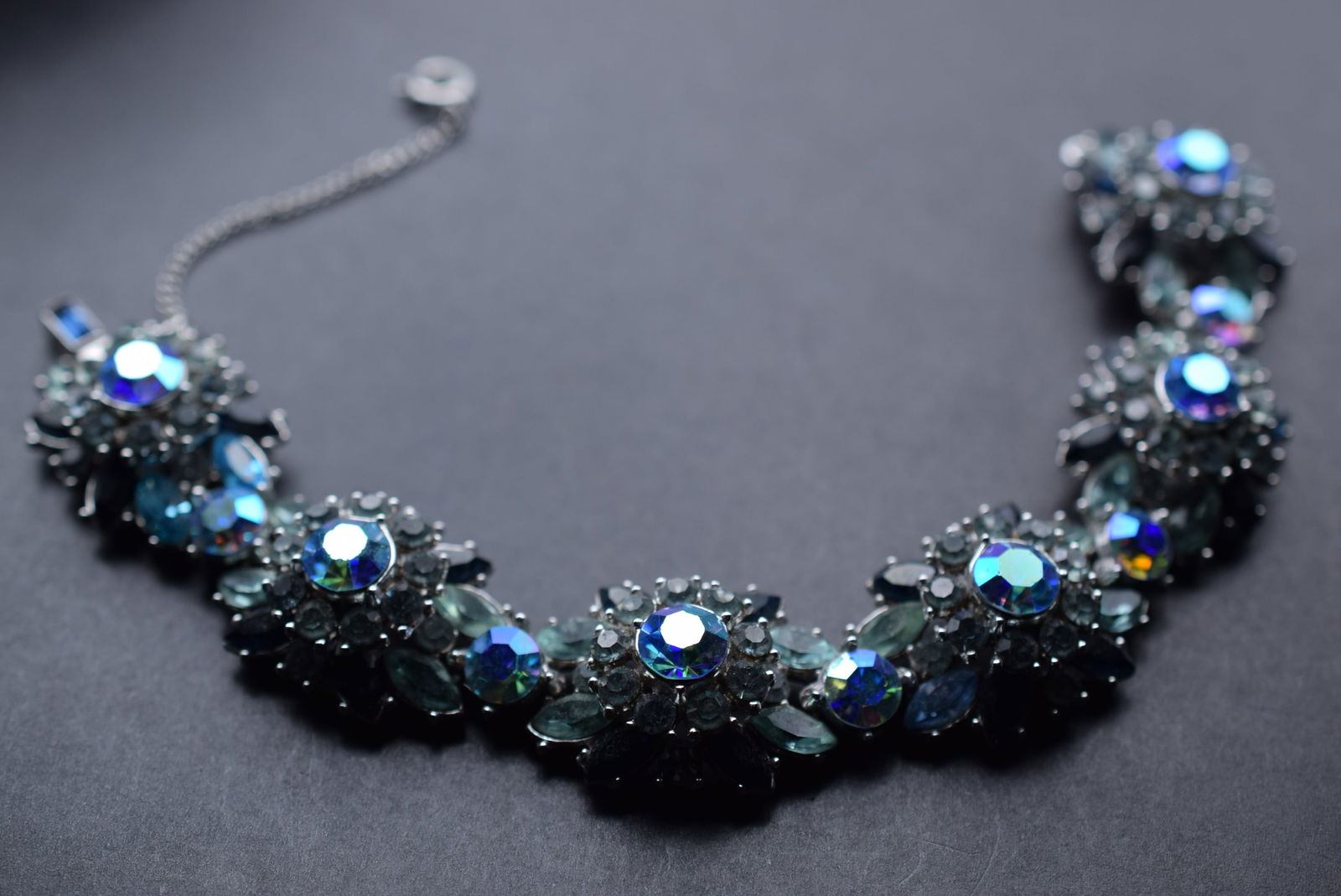 Trifari 1950's Rhinestone Cluster Bracelet Signed Lot 32: Trifari 1950's Rhinestone Cluster Bracelet Signed Trifari on the Clasp measures 7" x 7/8"