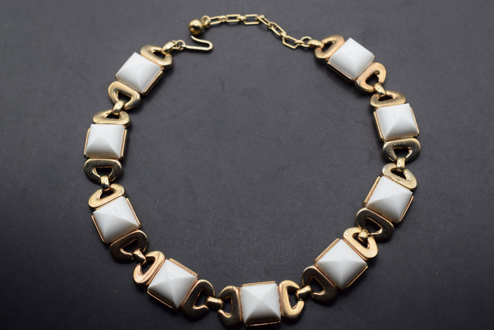 Trifari Thermo Plastic 1940's Necklace Signed Lot 82: Trifari Thermo Plastic 1940's Necklace Signed inside the clasp measures 16" long can be worn as short as 13 1/2" by using the connector hook