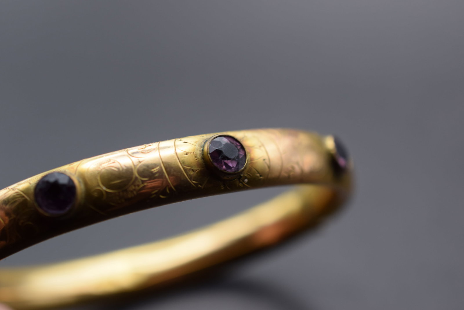 Edwardian Amethyst W&SBK Etched Hinged Gold Filled Bracelet Lot 91: Edwardian Amethyst W&SBK Etched Hinged Gold Filled Bracelet monogrammed MLF in scrollwork and is signed inside W&SBK measures 2 3/8" across the inside and is 3/8" wide