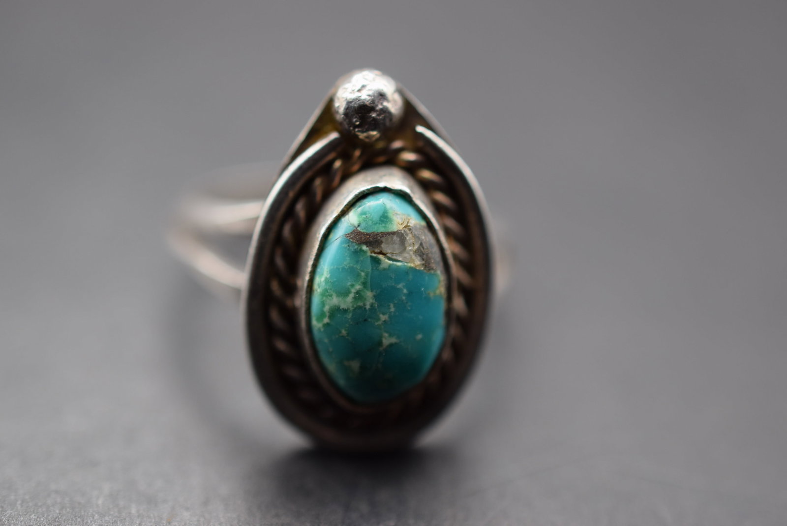 Turqouise Silver Ring Size 7.25 Lot 173: Turquoise Silver 925 Ring Size 7.25 weighs 4.11 grams top measures 7/8" x 5/8" unsigned