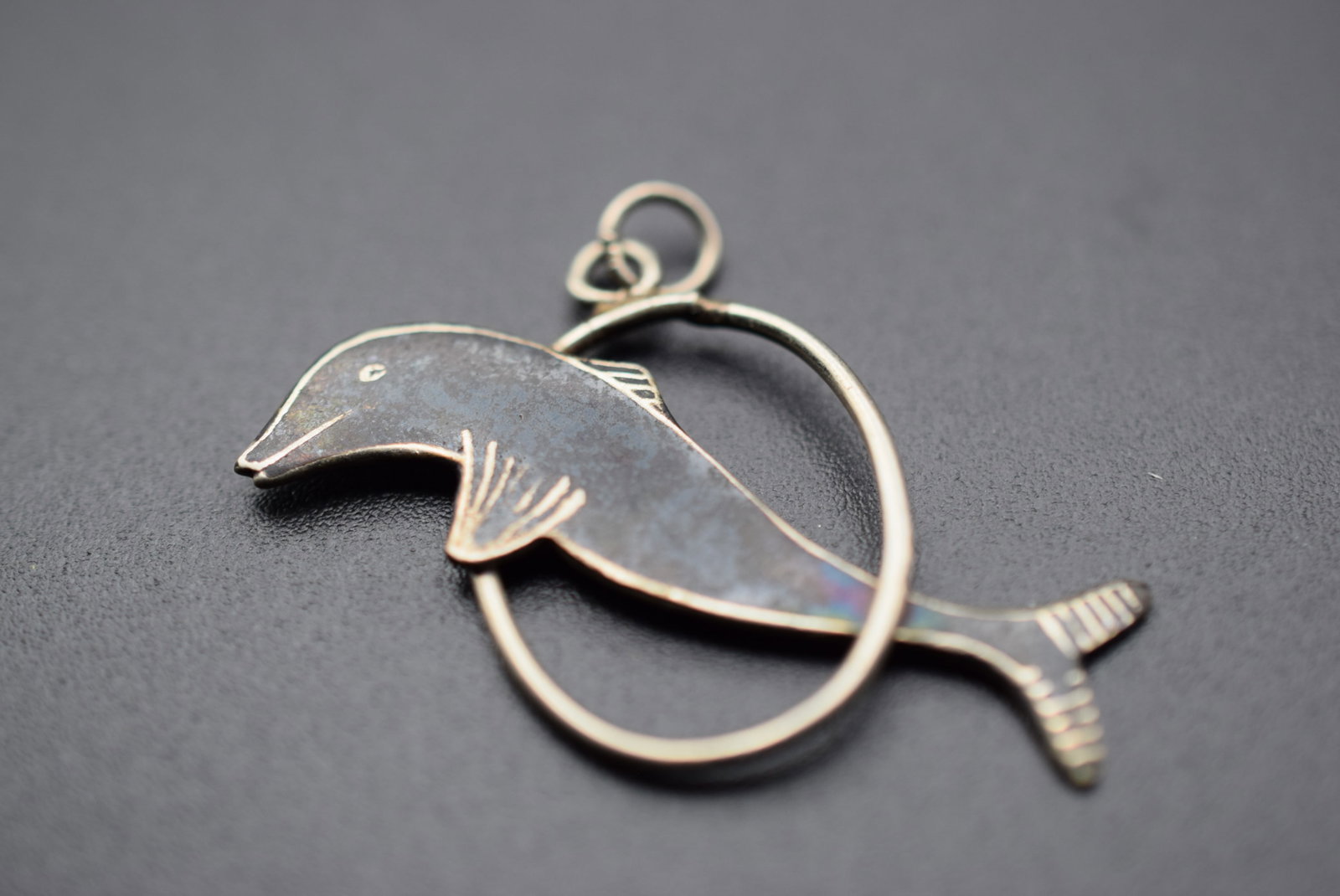 Dolphin Vintage Pendant Sterling Silver 925 Siam Damascene Niello Lot 702: Dolphin Vintage Pendant Sterling Silver 925 Siam Damascene Niello Weighs 2.44 grams measures 1 1/2" x 1" signed Siam Sterling