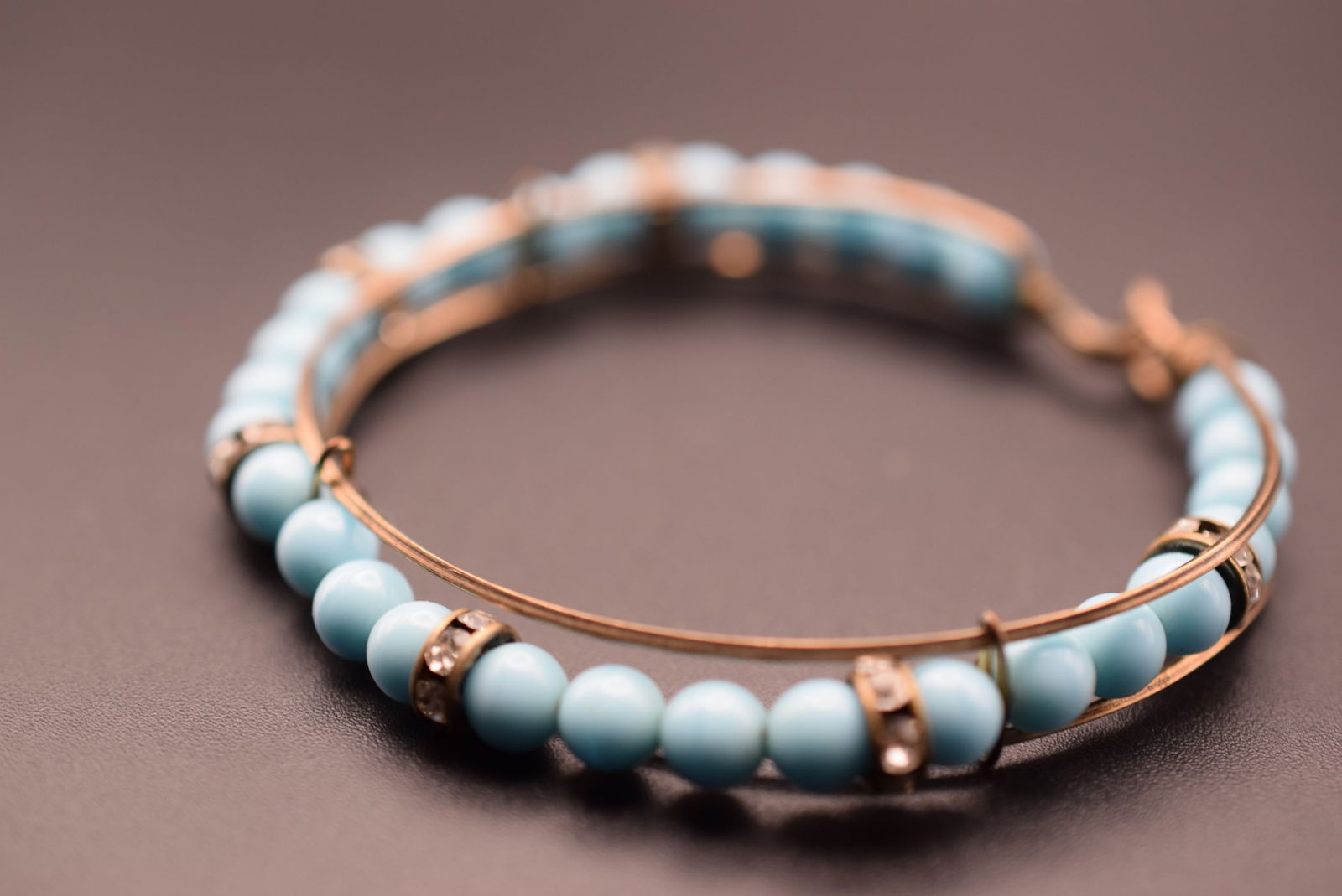 Handmade Vintage Bracelet Turquoise Glass and Rondelle Rhinestones Lot 709: Handmade Vintage Bracelet Turquoise Glass and Rondelle Rhinestones with clasp opening measures 2 1/2" wide