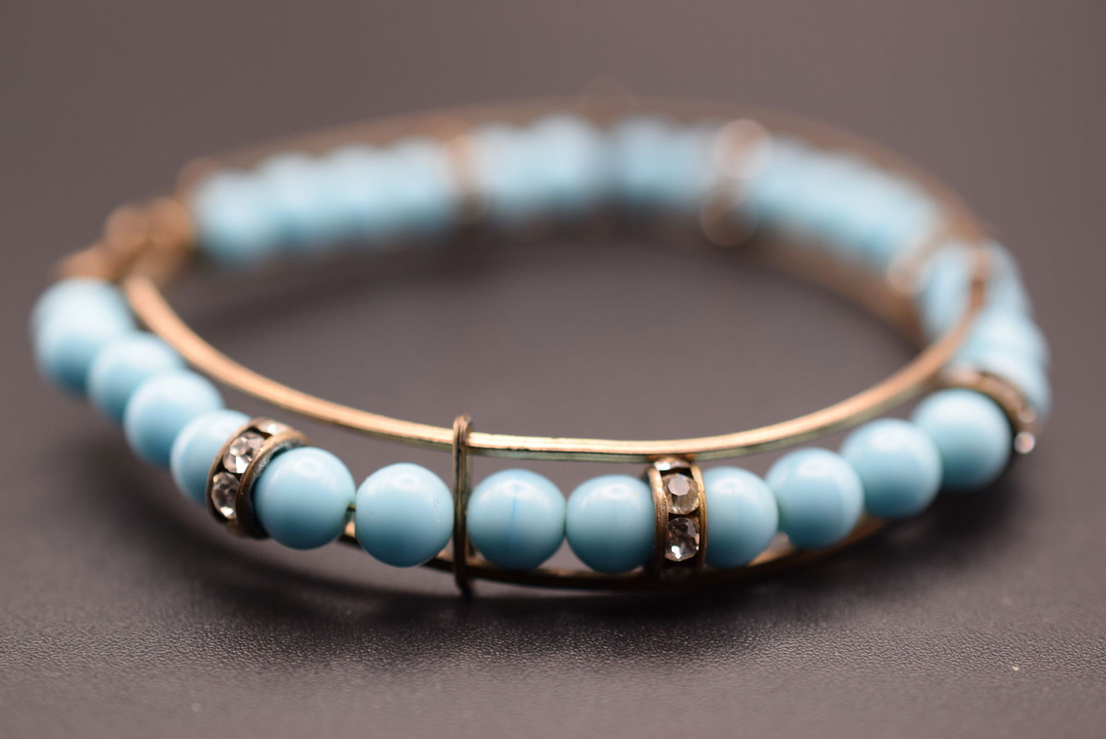 Handmade Vintage Bracelet Turquoise Glass and Rondelle Rhinestones Lot 711: Handmade Vintage Bracelet Turquoise Glass and Rondelle Rhinestones with clasp opening measures 2 1/2" wide