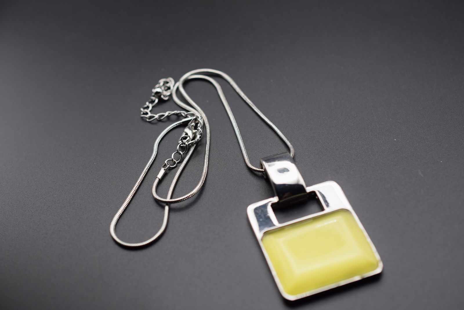 Yellow Cat's Eye Moonstone Necklace Lot 721: Yellow Cat's Eye Moonstone Necklace chain measures 21" wear as short as 17" with connector hook and pendant 2 1/2" x 1 1/4"