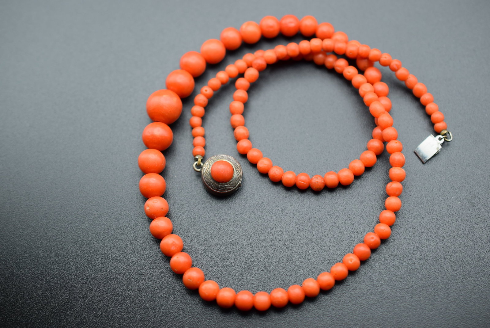 Genuine Vintage Coral Necklace Lot 748: Genuine Vintage Coral Necklace Weighs 18.25 grams measures 18 1/2" and beads are 3mm to 9mm graduating