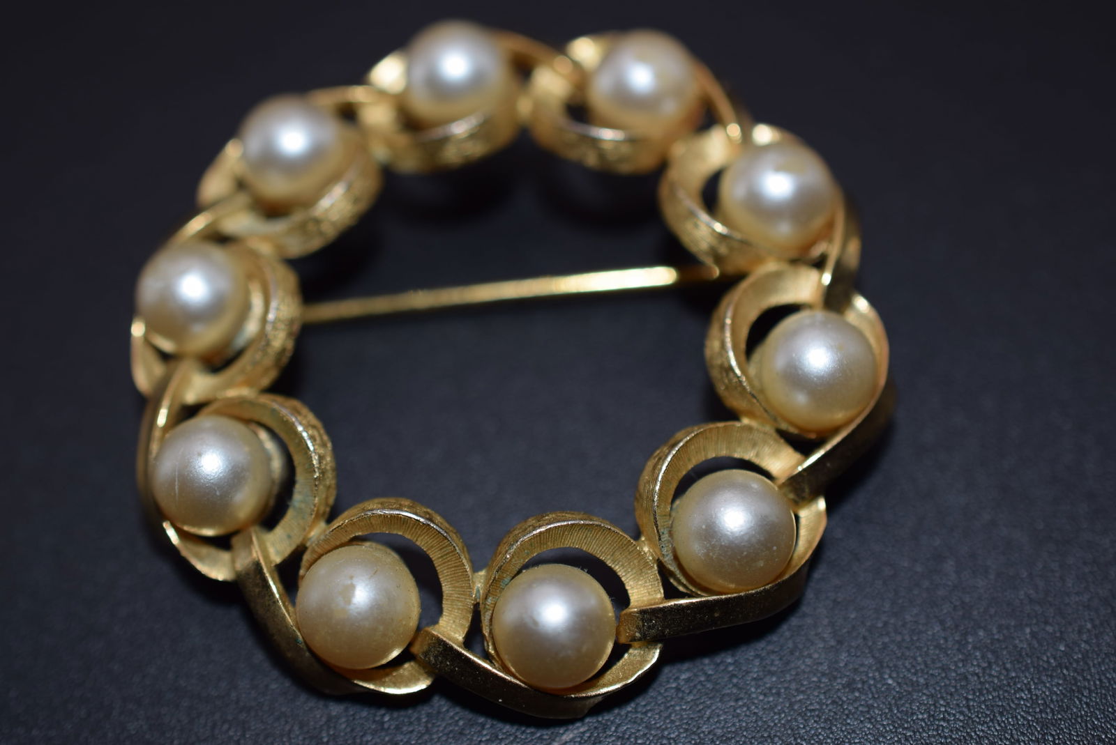 Trifari Vintage Gold and Pearls Brooch Pin Lot 860: Trifari Vintage Gold and Pearls Brooch Pin measures 1 7/8" in diameter some wear to the pearls signed Crown Trifari ©