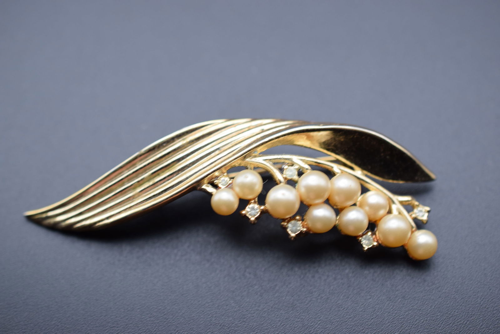 Trifari Mis Stamped Double 1940's Pearl and Goldtone Rhinestones Brooch Pin Lot 878: Trifari Mis Stamped Double 1940's Pearl and Goldtone Rhinestones Brooch Pin measures 2 7/8" x 7/8" signed Trifari Des. Pat No 172560