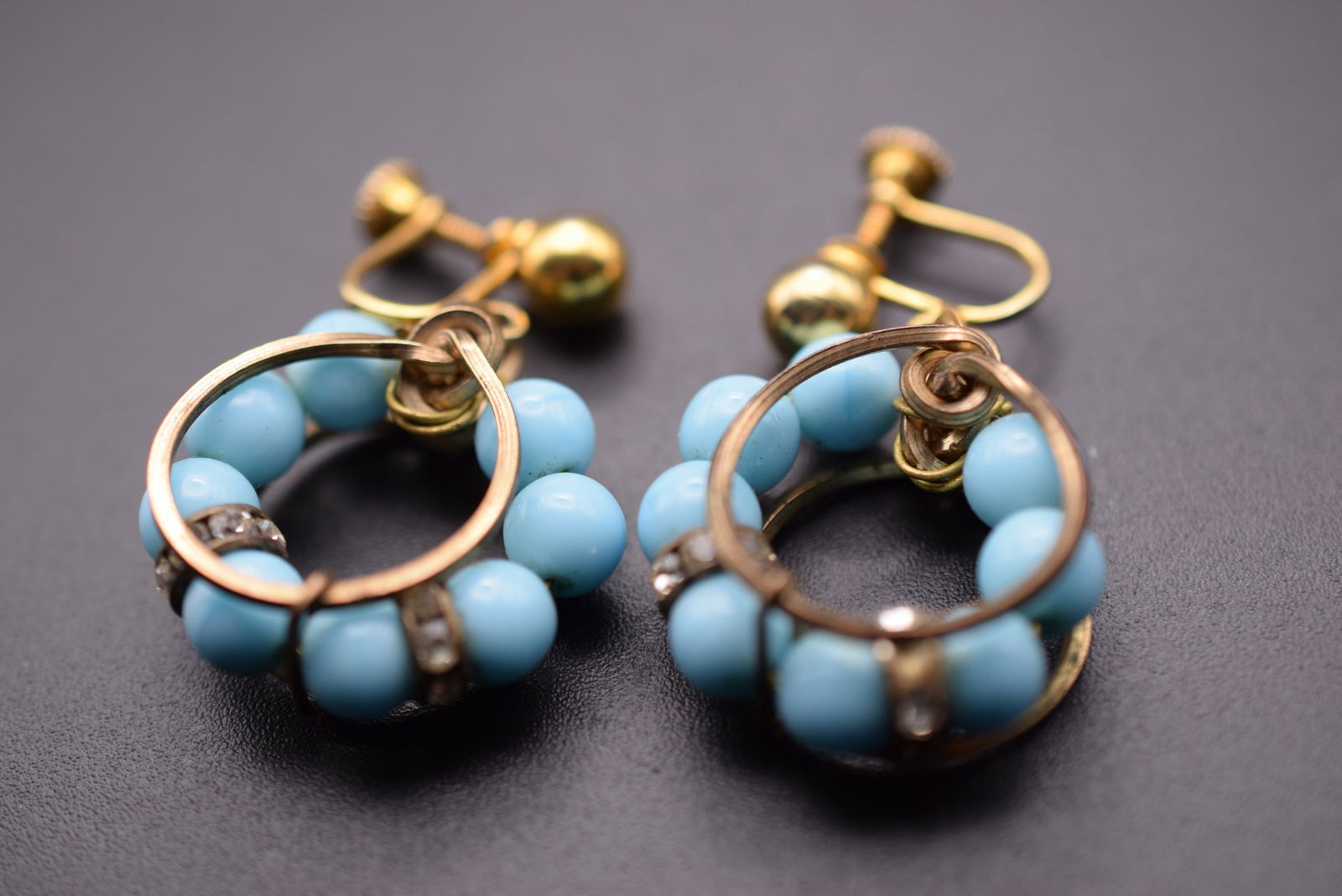 1960's Vintage Turquoise Glass and Rondelle Screwback Earrings Lot 902: 1960's Vintage Turquoise Glass and Rondelle Screwback Earrings measures 1" in diameter plus the bale