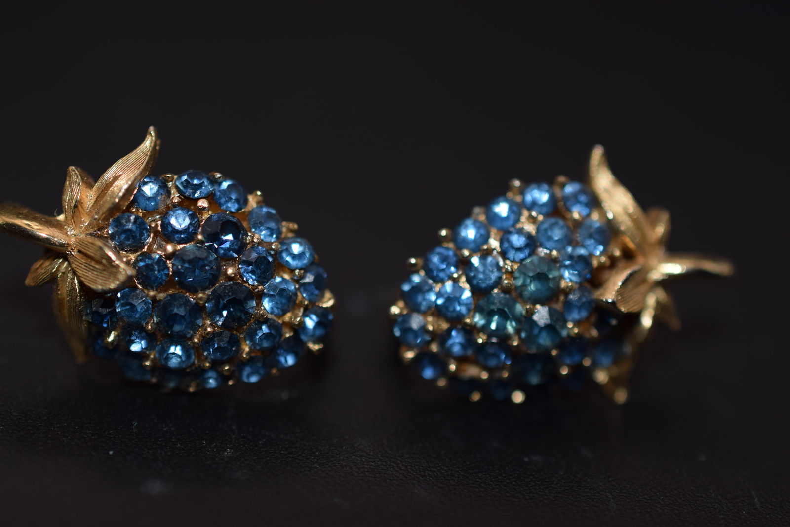 Trifari Blue Stawberry Rhinestone Clip Signed Earrings Lot 1011: Trifari Blue Stawberry Rhinestone Clip Signed Earrings measures 7/8" x 5/8" signed ©Crown Trifari