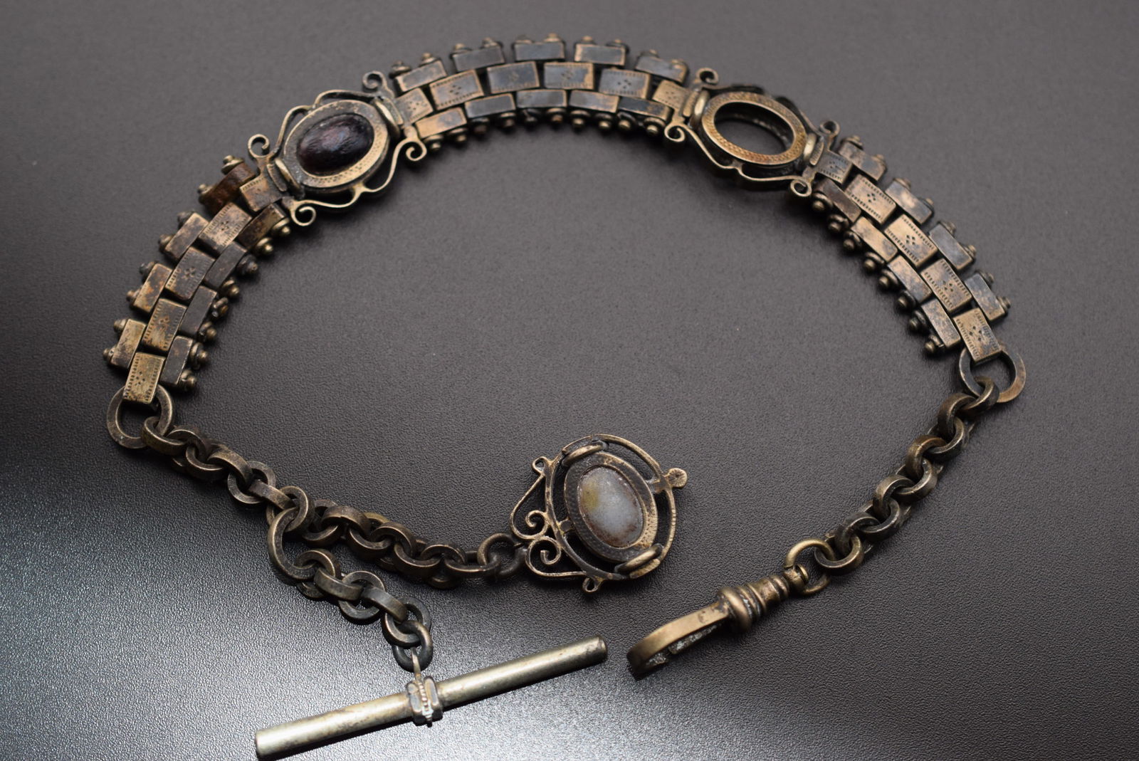 Victorian Outstanding Watch chain Fob Intricate Vintage WOW Lot 1059: Victorian Outstanding Watch chain Fob Intricate Vintage WOW measures 12" long and is missing one stone