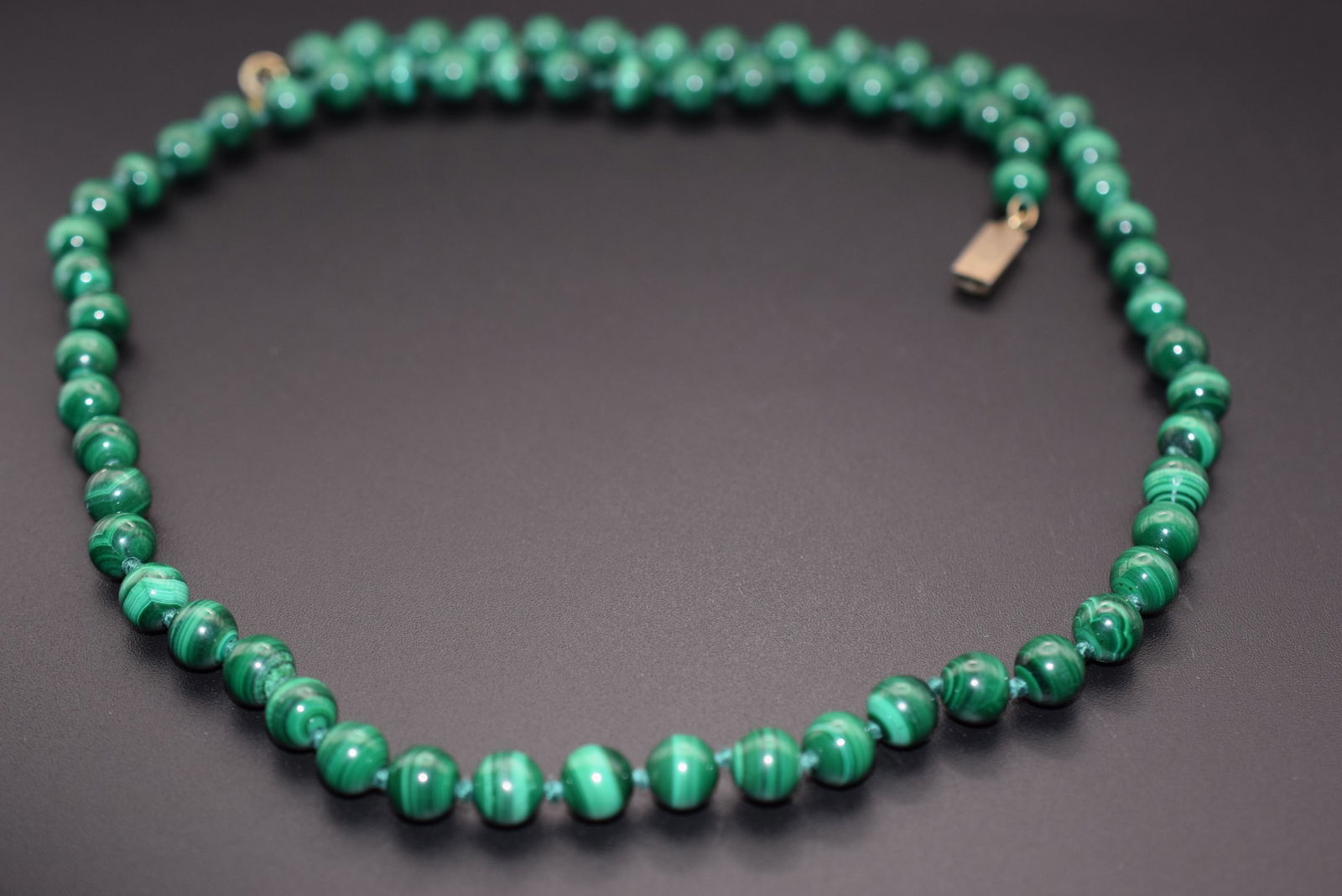 Malachite Knotted Sterling Silver 925 Vintage 8mm Necklace Lot 1139: Malachite Knotted Sterling Silver 925 Vintage 8mm Necklace measures 25" long signed Jka 925 on the clasp