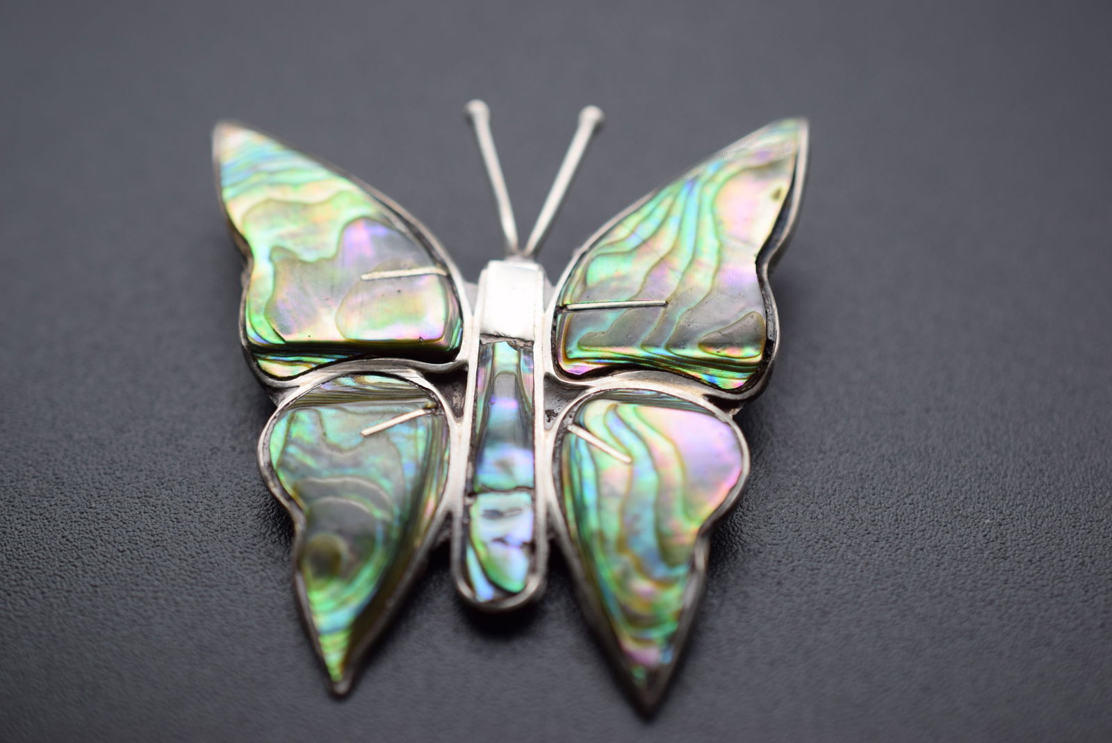 Abalone Mexico Taxco Sterling Silver 925 Butterfly Brooch Pin Signed Lot 1170: Abalone Mexico Taxco Sterling Silver 925 Butterfly Brooch Pin Signed measures 1 1/2" x 1 1/2" weighs 4.6 grams signed Mexico Sterling 3 inside eagle for Taxco